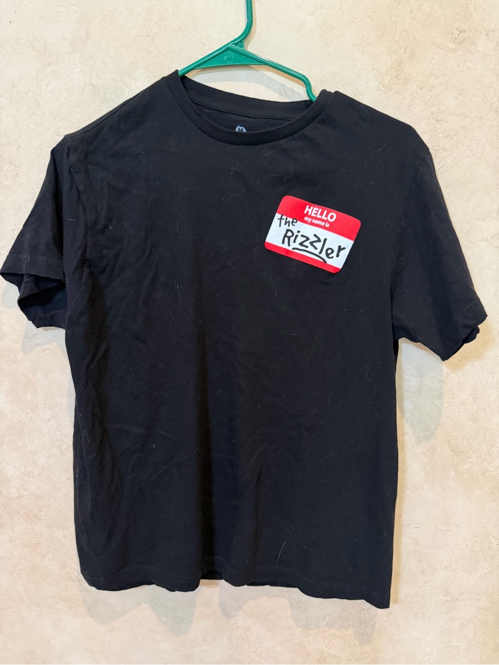 Black Tee with Red & White 'Hello My Name Is The Rizzler' Graphic medium